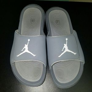 Gray Jordan slip on sandals
